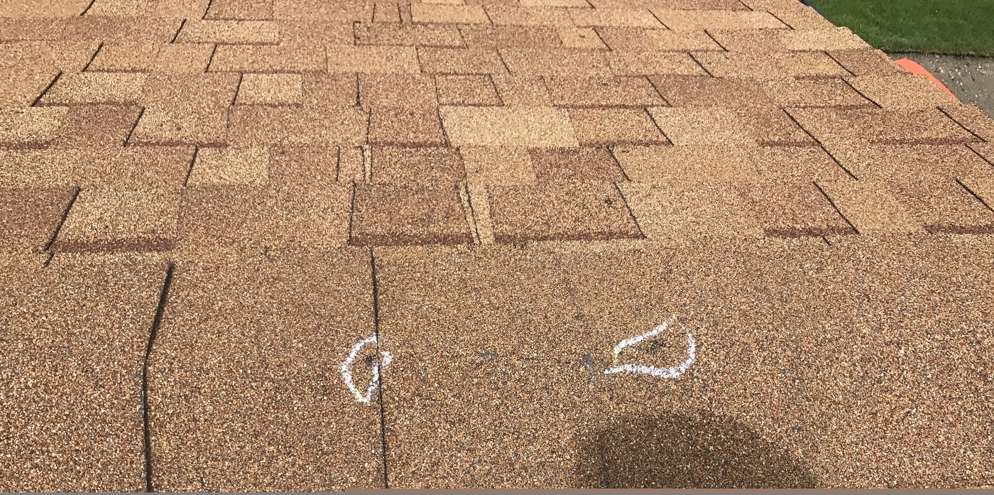 shingle roof with hail damage